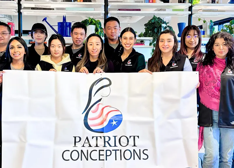 A compassionate doctor in a consultation with intended parents.