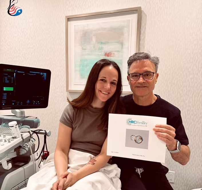 Fertility-clinic visit with ultrasound equipment and a printed embryo image