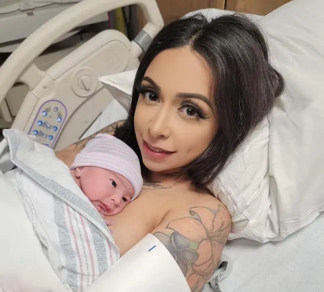 A joyful baby shower scene with friends and family celebrating the intended parents.